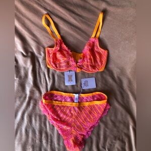 Savage x Fenty lace bra and panty set in pink/orange